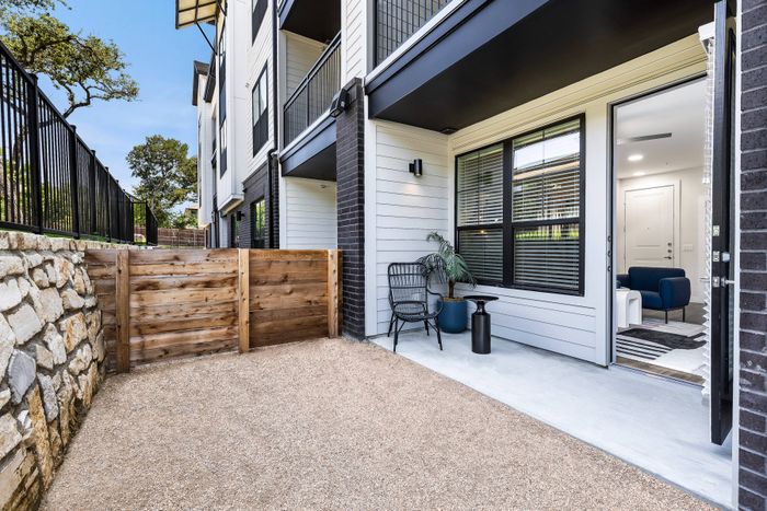 Apartment home with an attached fenced yard at Perch Apartments in South Austin, TX.