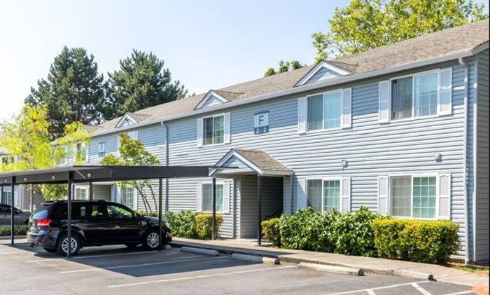 exterior two story building with carport