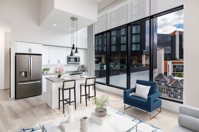 Model with Expansive Floor-to-Ceiling Windows