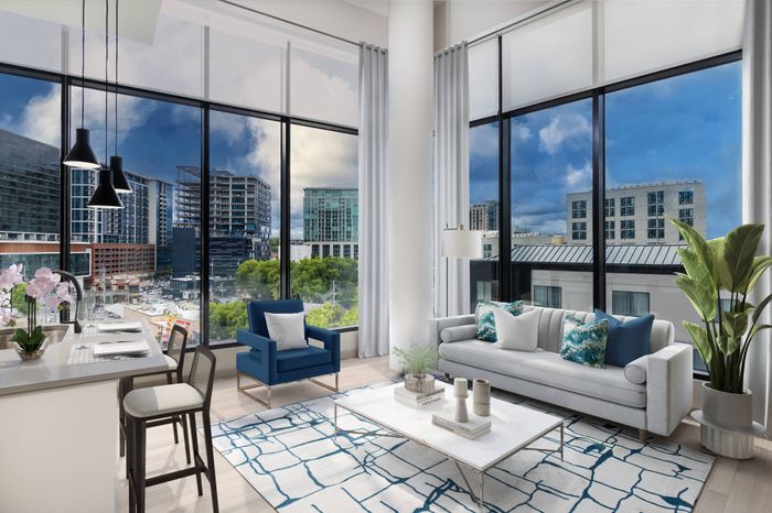 Model with Expansive Floor-to-Ceiling Windows