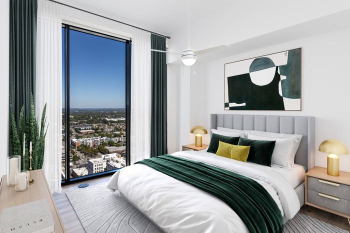 Spacious Penthouse Bedroom with Floor-to-Ceiling Windows