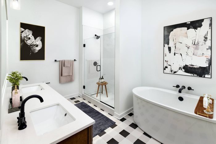 Luxe Penthouse Bathrooms with Walk-in Tiled Shower and Soaking Garden Tub