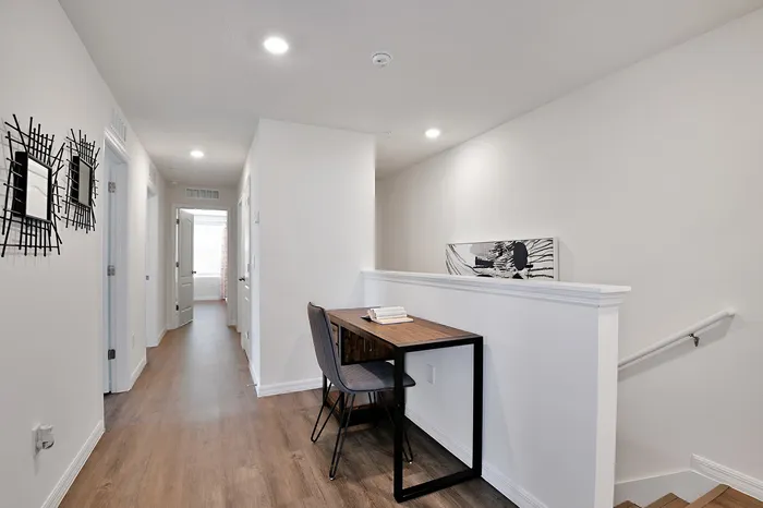 Upstairs hallway and office area at a home for rent in Apopka, Florida.