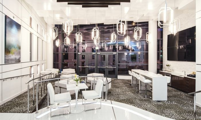 LobbyResident lounge at our apartments for rent in Atlanta, GA, featuring cushioned chairs and modern decor.