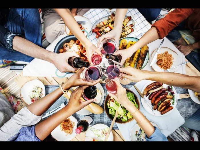 Friend toasting to a fun night out
