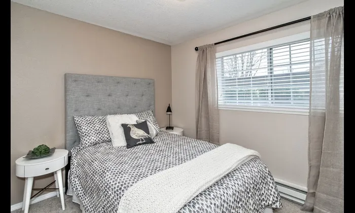 Bedroom with carpet