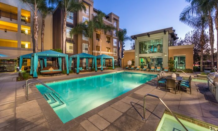 Outdoor Pool at Night + Cabanas