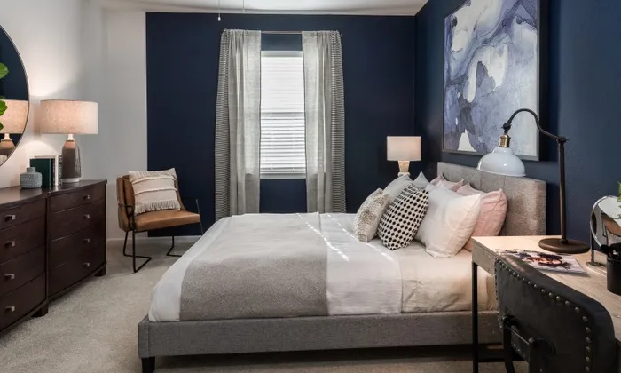 spacious bedroom featuring a king sized bed