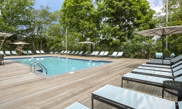 Sun-filled outdoor pool and lounge deck