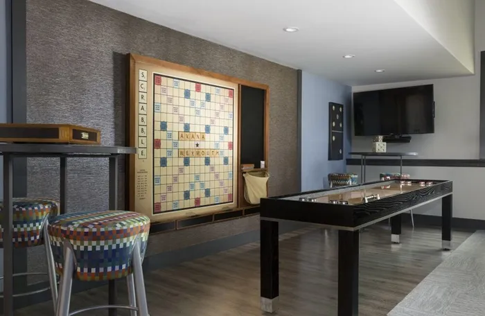 Wall-mounted scrabble in game room