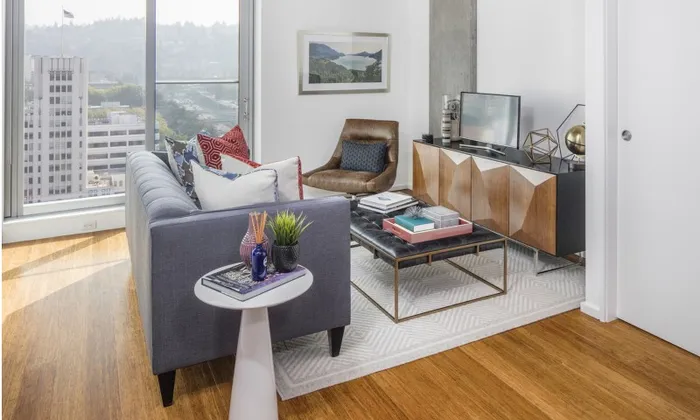 A cozy living space in the corner of a high rise Portland apartment overlooking downtown.
