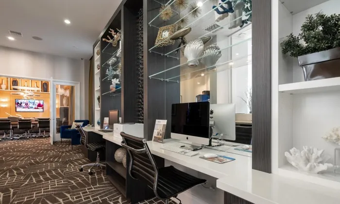 A cyber cafe equipped with macbooks inside the Franklin Delray apartments.