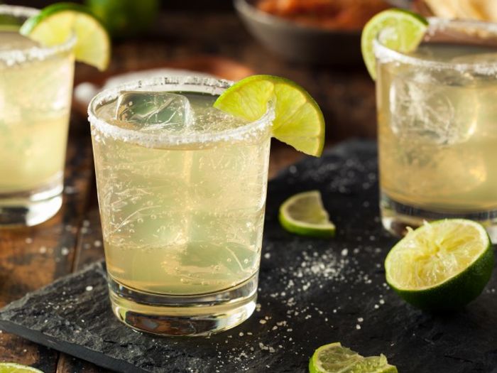 Margaritas with Lime on Black Table