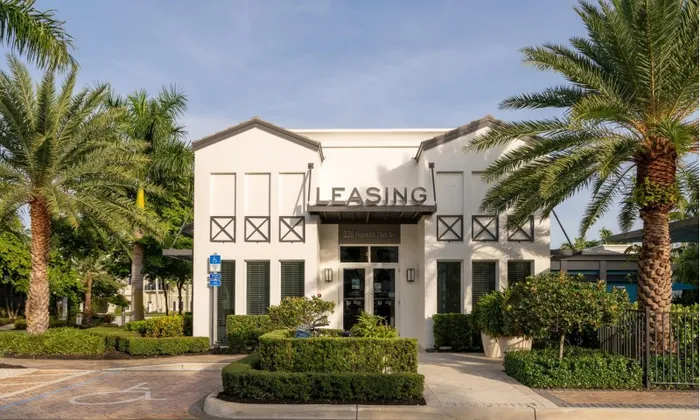 The leasing office at our apartments in Delray Beach, featuring a view of the exterior of the leasing office building.