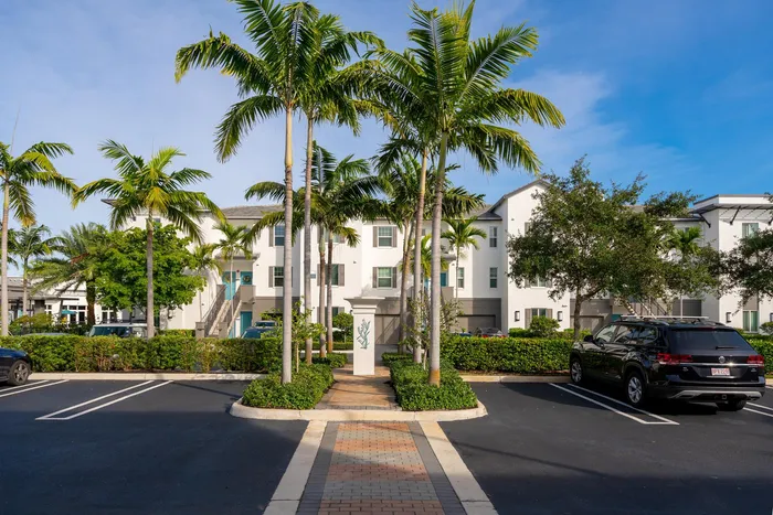 Parking lot and exterior view of the Franklin Delray apartments.