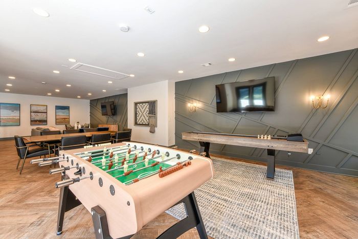 Game room at luxury apartments in Alpharetta, GA.