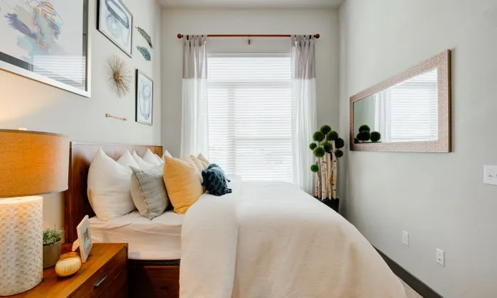 Bedroom view of bed and window
