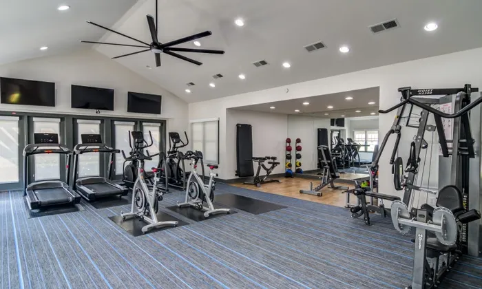 Fitness center at an apartment in Alpharetta.