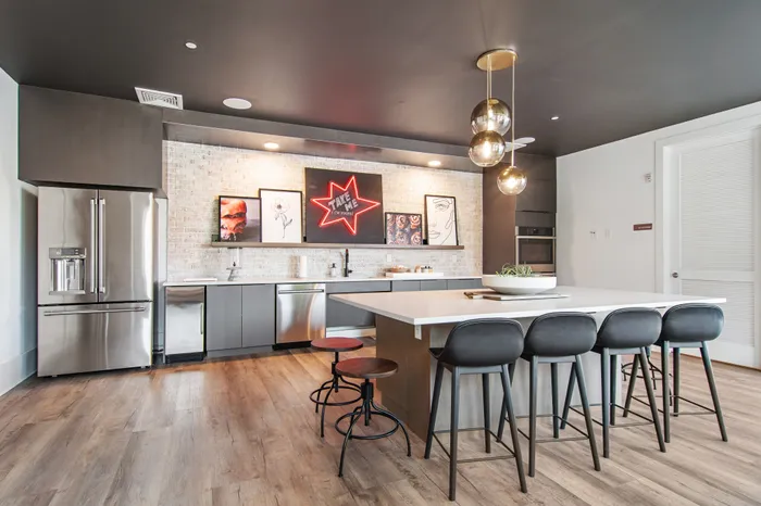 Clubhouse kitchen with bar and seating