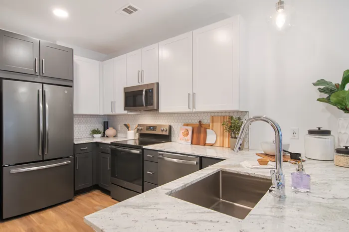 Kitchen with granite counters and stainless steel appliances