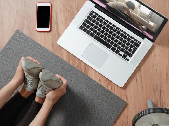 woman doing a virtual workout