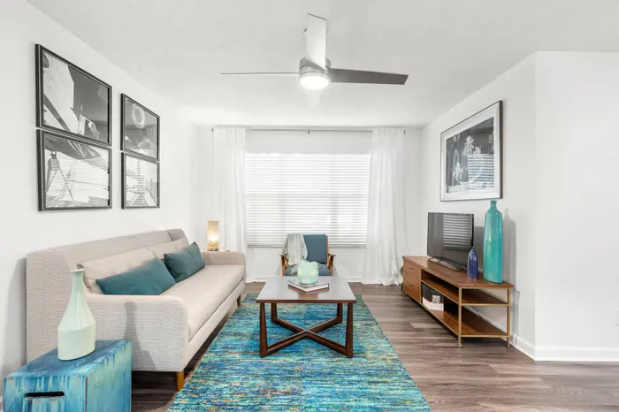 Luxury living room with a large couch in a Clearwater apartment for rent.