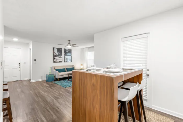 Dining room with four-seater high table in an apartment near Dunedin, FL.