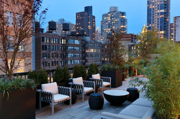 City terrace with lounge chairs