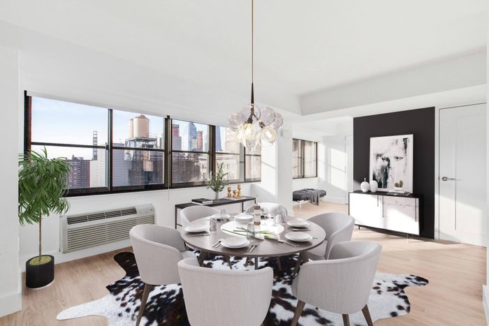 Dining room with city view through large windows