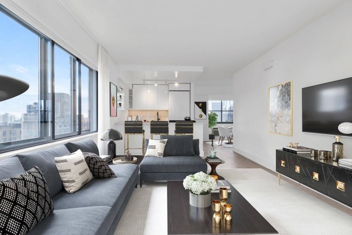 Living room and kitchen with open floor plan