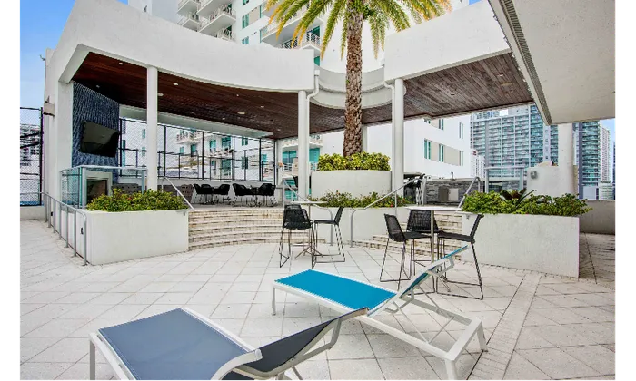Outdoor patio and lounge by luxury Miami apartments.