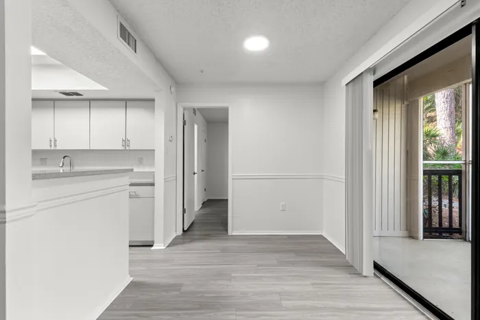 Model dining room and kitchen at our apartments in Clearwater, FL.