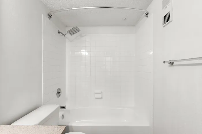Bathroom with spacious vanity in an apartment on Coachman Rd in Clearwater, FL.
