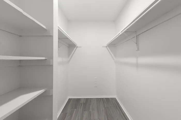 Spacious walk-in closet in an apartment on Coachman Rd in Clearwater, FL.
