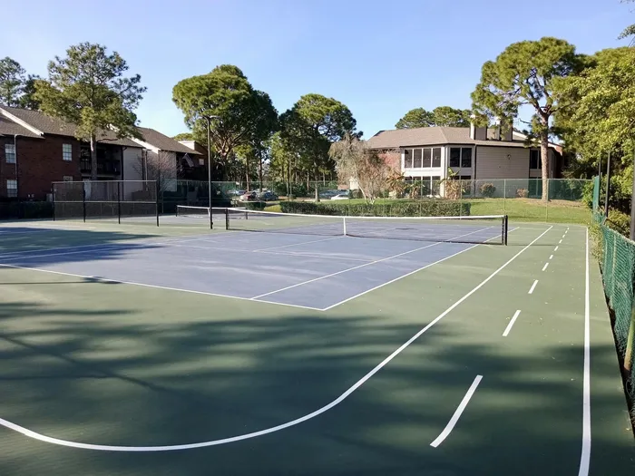 Full size tennis court and two pickle ball courts