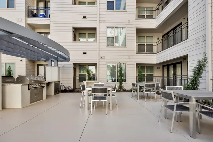 Grill and outdoor dining tables
