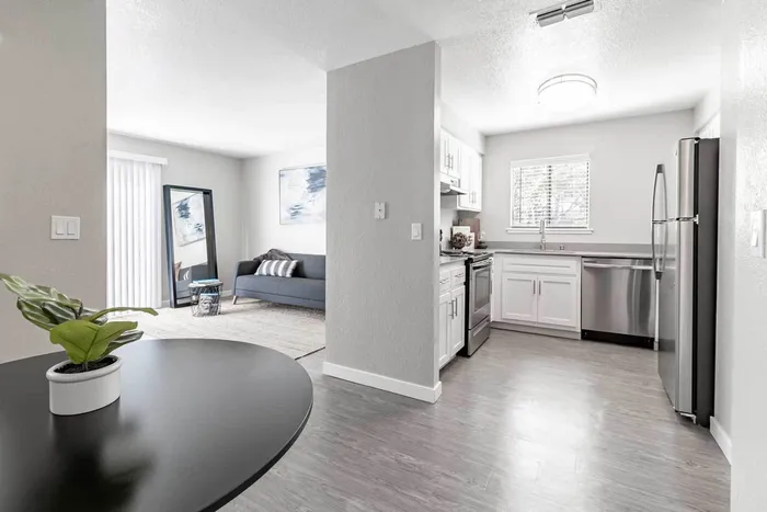 Avana Vista Point model kitchen with white cabinets and stainless appliances