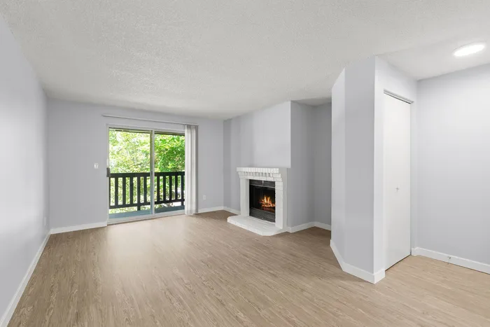 vacant living room with fireplace