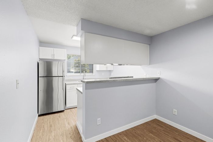 vacant kitchen and dining