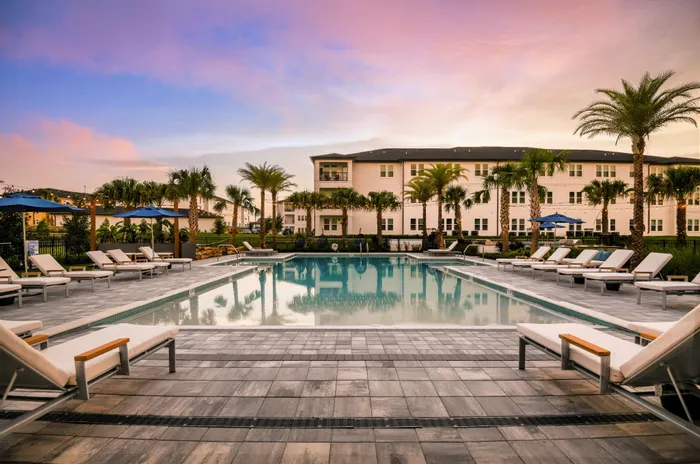 Pool Courtyard at sunset with beautiful sky