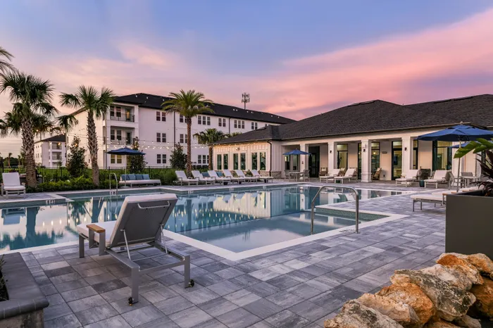 Pool Courtyard and Clubhouse at sunset