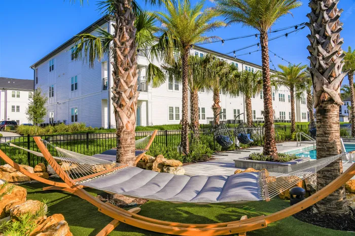 Poolside Hammock Garden with Palm Trees