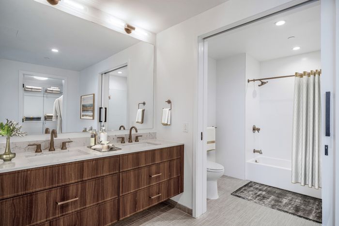 Penthouse bathroom with double vanity sinks