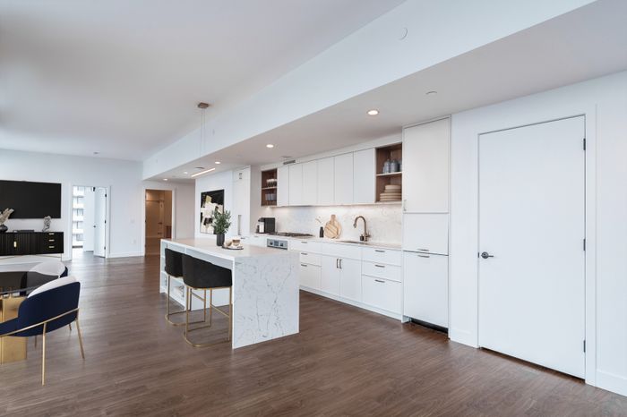 Penthouse kitchen with waterfall island