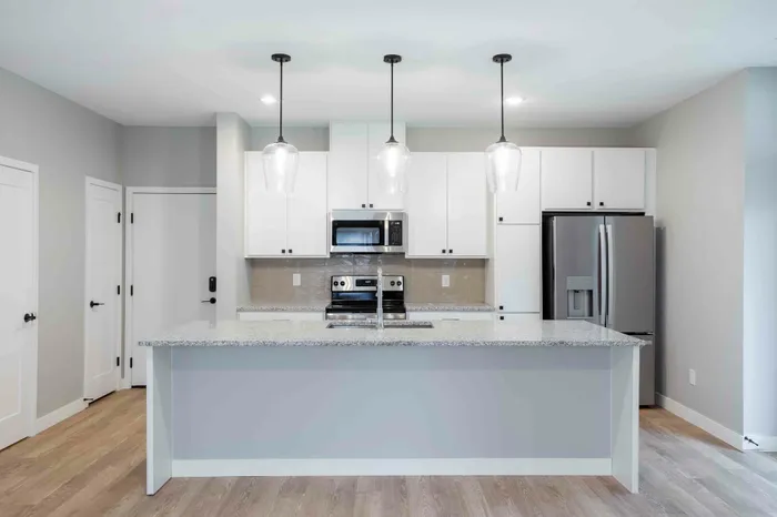 kitchen island with stainless steel appliances