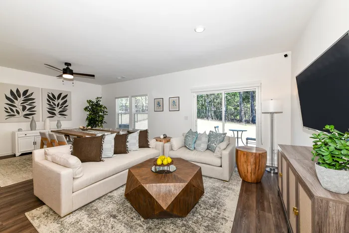 living room with beige couches