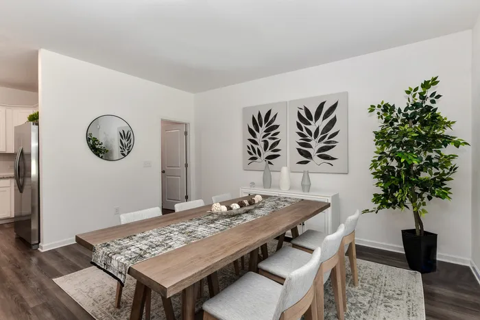 dining room with neutral colored chairs