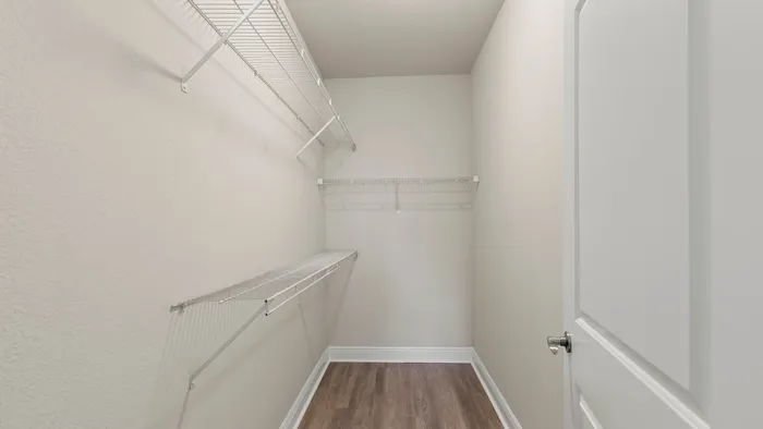 Platinum apartment home bedroom closet with ample storage