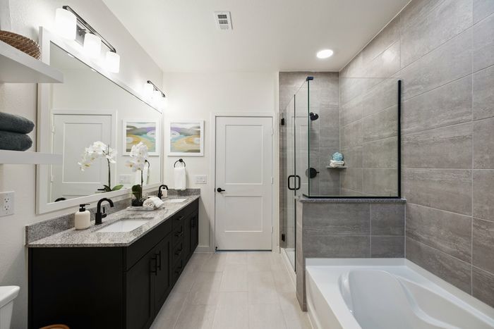 Primary Bathroom with Standing Shower and Garden Tub