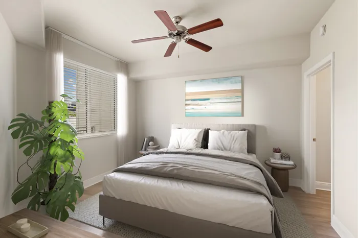 Platinum apartment home bedroom with airy ceilings and a ceiling fan